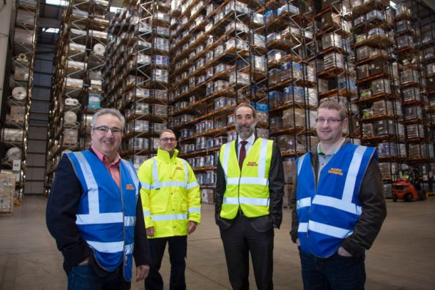 men in high viz in warehouse