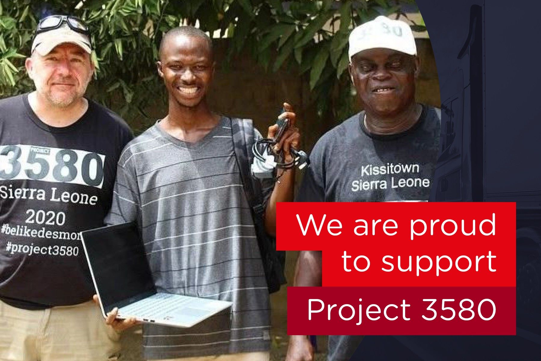 Three Men from Sierra Leone holding laptop