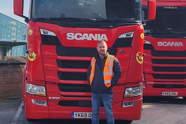 man standing in front of truck