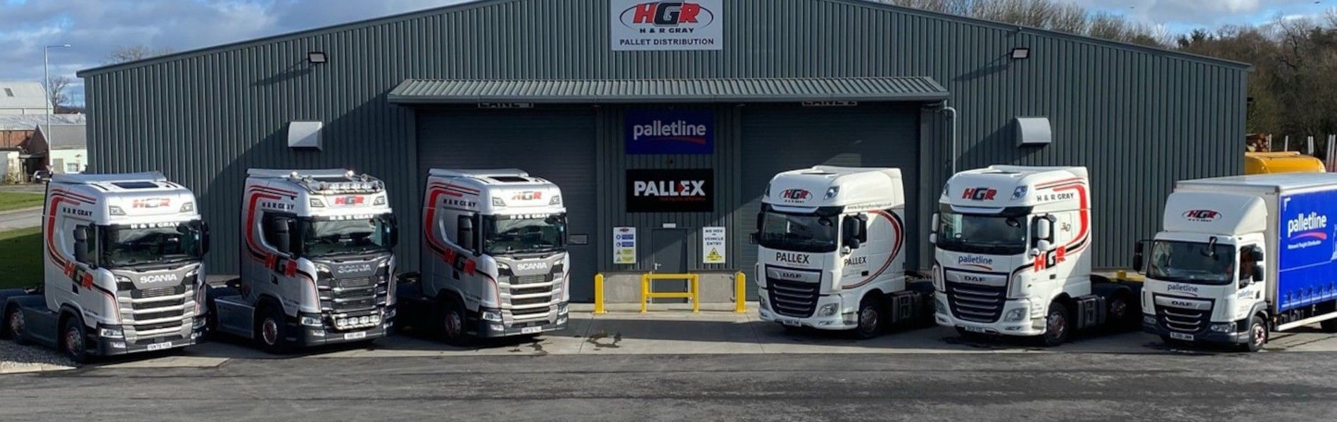 6 H & R Gray Lorries outside the warehouse